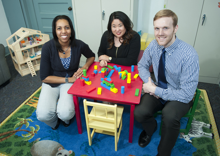 Under the guidance of Mississippi State Assistant Professor Torri M. Jones, left, graduate clinician Janet W. Kwan and postdoctoral fellow and mid-level clinical supervisor Christopher W. Drapeau are among those at Mississippi State’s Psychology Clinic who are administering brief behavioral intervention services for children age 2 to 6 years old. (Photo by Russ Houston)
