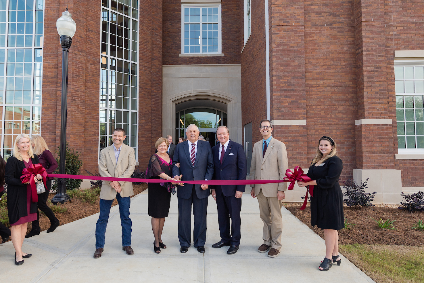 MSU leaders prepare to cut a ribbon in front of the new Richard A. Rula Engineering and Science Complex