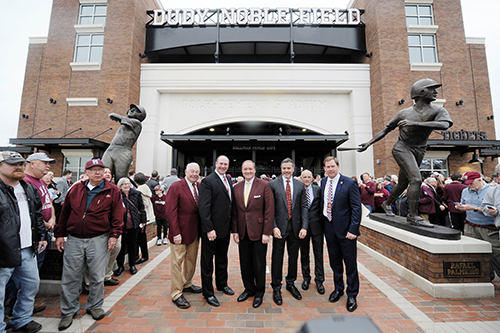 Celebrating the new “Thunder and Lightning” statues unveiled at Friday’s [Feb. 15] event are, from left, Dudy Noble Field project benefactor Richard Adkerson, Bulldog baseball legend Will Clark, MSU President Mark E. Keenum, Bulldog baseball legend Rafael Palmeiro, Voice of the Diamond Dawgs Jim Ellis, and MSU Athletic Director John Cohen. (Photo by Logan Kirkland)