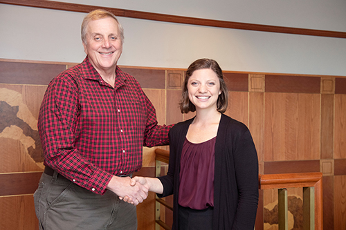 Robby Toombs, region manager, Delta Region at RMS, congratulates junior forestry major Samantha Seamon for receiving the company’s first $10,000 scholarship at MSU. (Photo by Beth Wynn) 