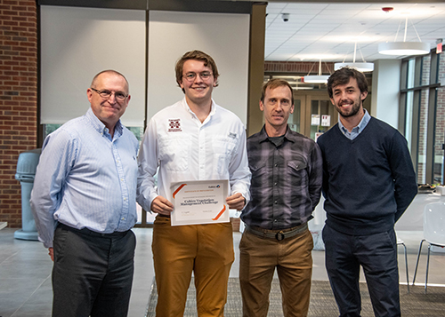 From left to right, Adam Overfield, senior vice president, Cubico Sustainable Investments; William Stark, MSU agronomy graduate student; Jay McCurdy, associate professor in agronomy and turfgrass, and Yago Cavenagh, associate, Cubico Sustainable Investments. 
