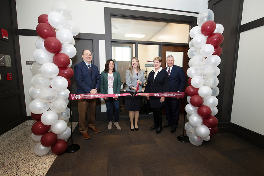 From left, College of Arts and Sciences Dean Rick Travis, MSU Libraries Dean Lis Pankl, Speaking Center Director and Instructor of Communication Cheryl Chambers, and donors Jean and Tom Freeman celebrate a ribbon cutting for the new university center earlier this spring. 