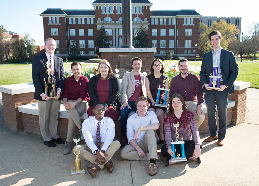 Mississippi State University Speech and Debate Council members include (front row, left to right) Ty Riley, Christian Donoho and Maggie Bridges; (back row, left to right) William Bonduris, Sean McCarthy, Athena Kavanagh, Spyro Spanos, Mackenzie Ellis, Luke Acuff and Josh McCoy. Not pictured are Tori Boatner, Isaiah Brooking, Alicia Brown, Stevie Flynt, Parker Krag, Julia Rachel Kuehnle, Chad Rogers and Georgie Swan. (Photo by Megan Bean)