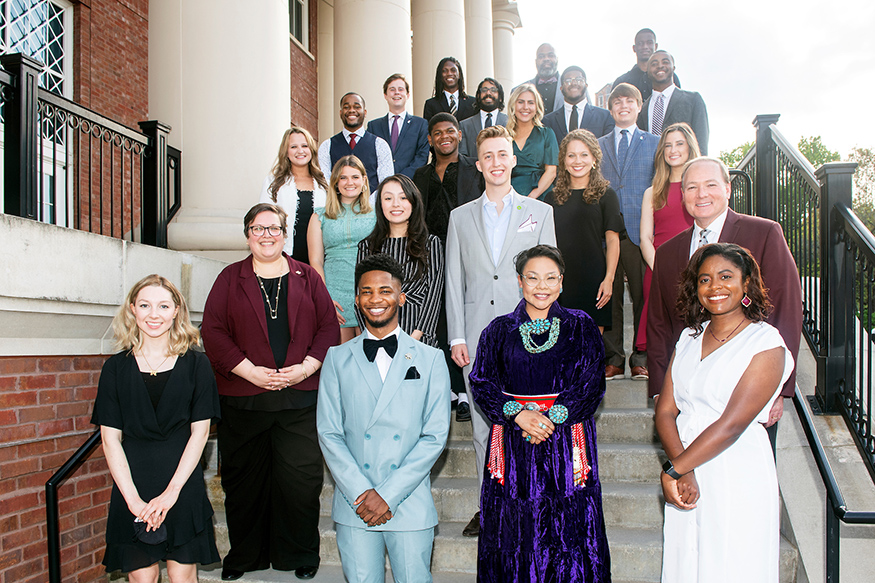 A group of MSU students are pictured with Vice President of Student Affairs Regina Hyatt and MSU President Mark E. Keenum