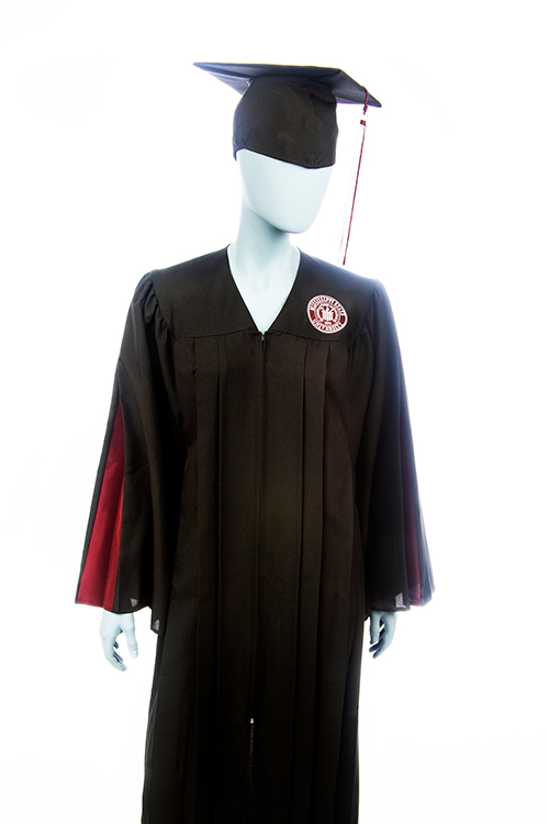 A mannequin models new MSU regalia featuring maroon and white university seals and inverted maroon pleats in each sleeve