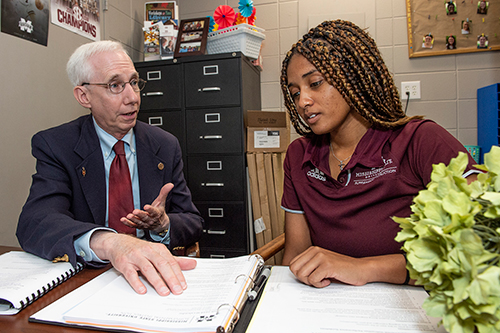 Tom Carskadon, professor of psychology, and Amber Jackson, a senior chemical engineering major from Madisonville, Louisiana who served as student leader of Supplemental Instruction for Carskadon’s general psychology class this fall, met weekly to go over course content. (Photo by Logan Kirkland)