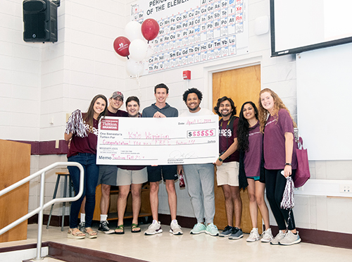 Kyle B. Wigginton of Tupelo (fourth from left) was awarded free tuition from members of the MSU Alumni Delegates on April 15. Pictured from left are organization members: Brittany Corder, president; Parker Thoms; Nate Bell, secretary; Wigginton; Kerry Steen, vice president of education; Osvaldo Ballesteros Garcia, vice president of publicity; Roshini Patel and Emily McGinity. (Photo by Beth Wynn)