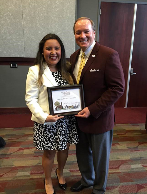 Vanessa Velasquez is pictured with MSU President Mark E. Keenum on the occasion of her receiving the university’s Spirit of State Award during her time as a student. 