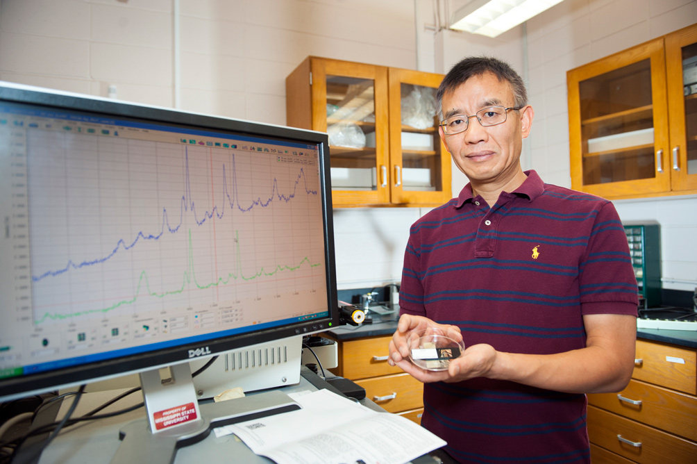 Dongmao Zhang, MSU associate professor of chemistry, is among a prestigious group of researchers from around the world cited in the Journal of Physical Chemistry C. (Photo by Russ Houston)