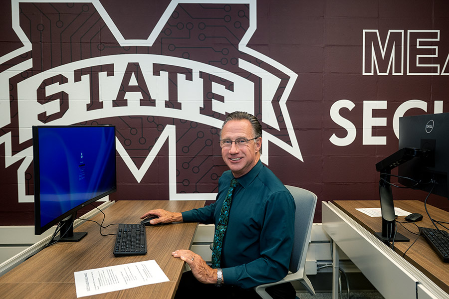 man in front of computer