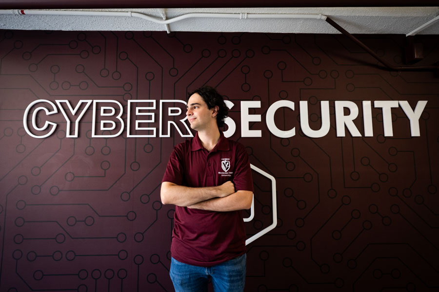 man in maroon shirt