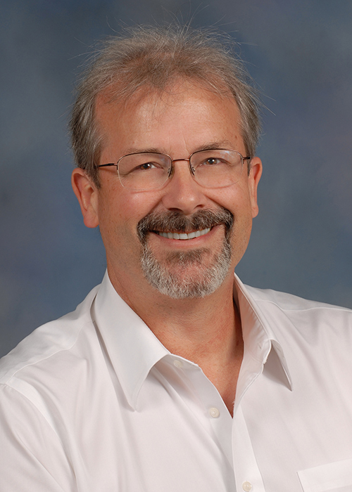 Studio portrait of Jeffrey Dean