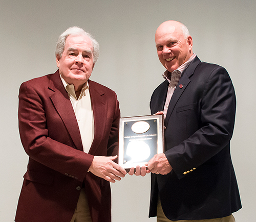 John M. Dean, left, a 1966 agribusiness alumnus, received a 2016 alumni achievement award from MSU College of Agriculture and Life Sciences Dean George Hopper during the annual alumni breakfast. (Photo by Karen Brasher)