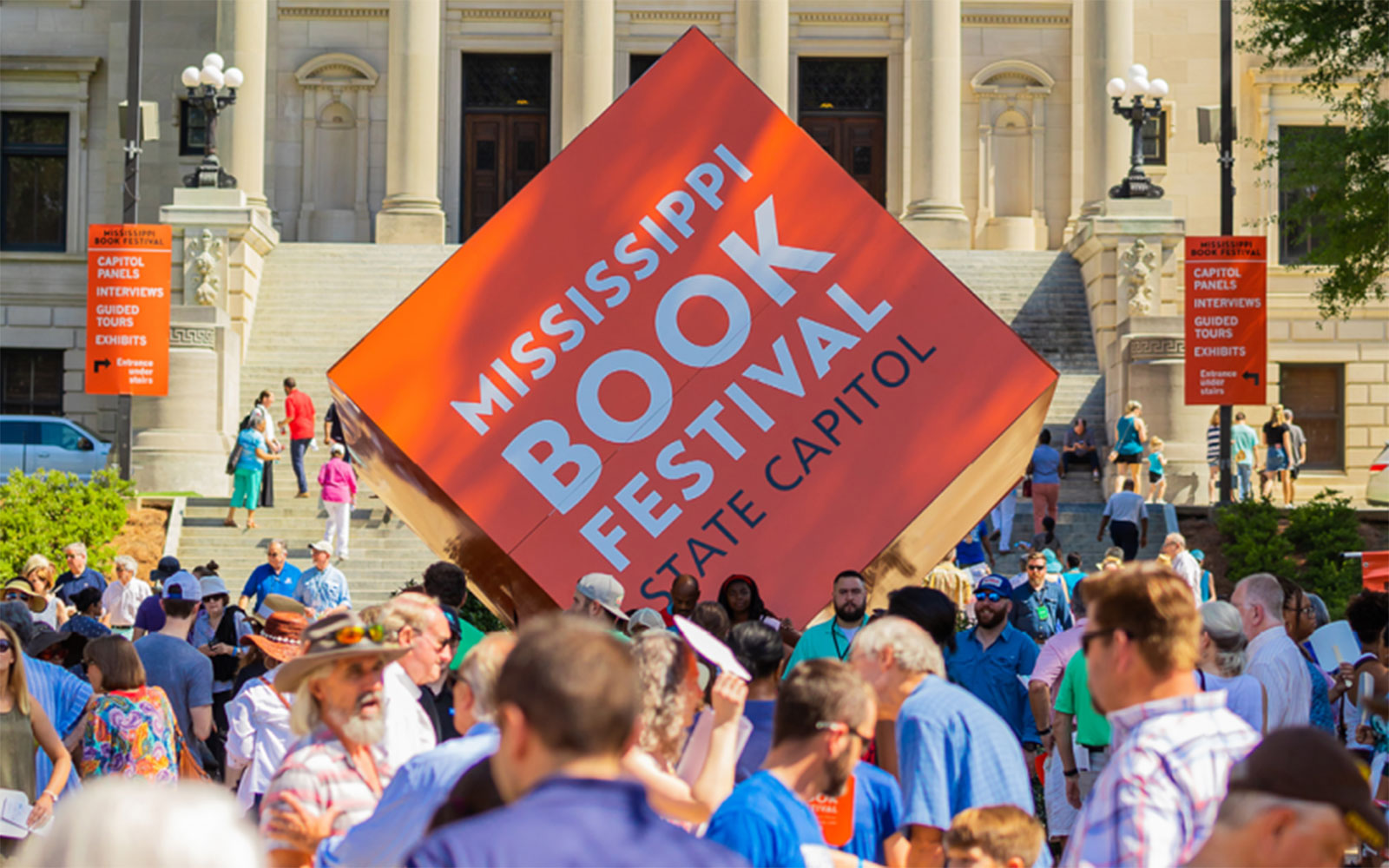 Mississippi Book Festival's Orange Cube Signage sitting out front of the State Capitol
