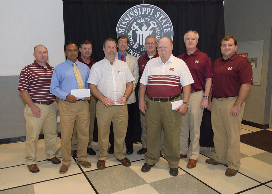 Taking part in the recent Regions Bank-sponsored awards ceremony at Mississippi State were (l-r) Alan Sims, Raja Reddy, Keith Mitchell, Richard Harkess, Gregory Bohach, Samuel Slaughter, Michael Barnes, George Jarman, and Walt Stephens. Reddy, Harkness, Bohach and Barnes are with the university, while Simms, Mitchell, Slaughter, Jarman and Stephens repre-sented the bank. (Photo by Kevin Hudson)