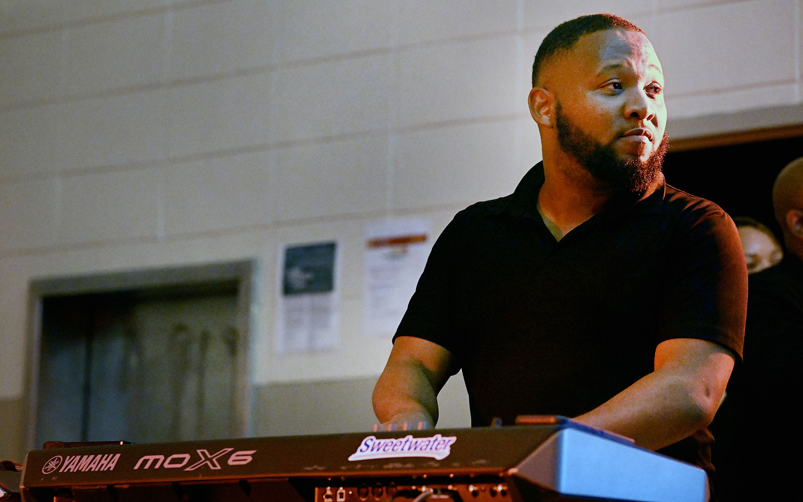 man playing keyboard