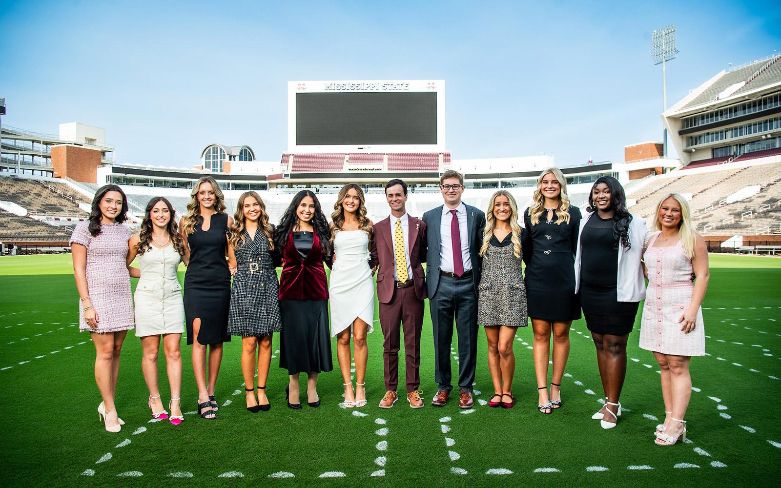 The MSU Homecoming Court from left, Sonia Ross of D’Iberville; Abigail Spreen of Metairie, Louisiana; Josephine Smith of Ridgeland; Jessica Zajac of State College, Pennsylvania; Khaoula Kamal of Tupelo; Abigail Henderson of Tupelo; Hayden Cherry of Halls, Tennessee; Robby Skelton of Collierville, Tennessee; Kendall Sanders of Calera, Alabama; Abigail Thorson of Huntsville, Alabama; Carrie McKenzie Bivens of Houston; and AnnCarter Perkins of Louisville. (Photo by Grace Cockrell)