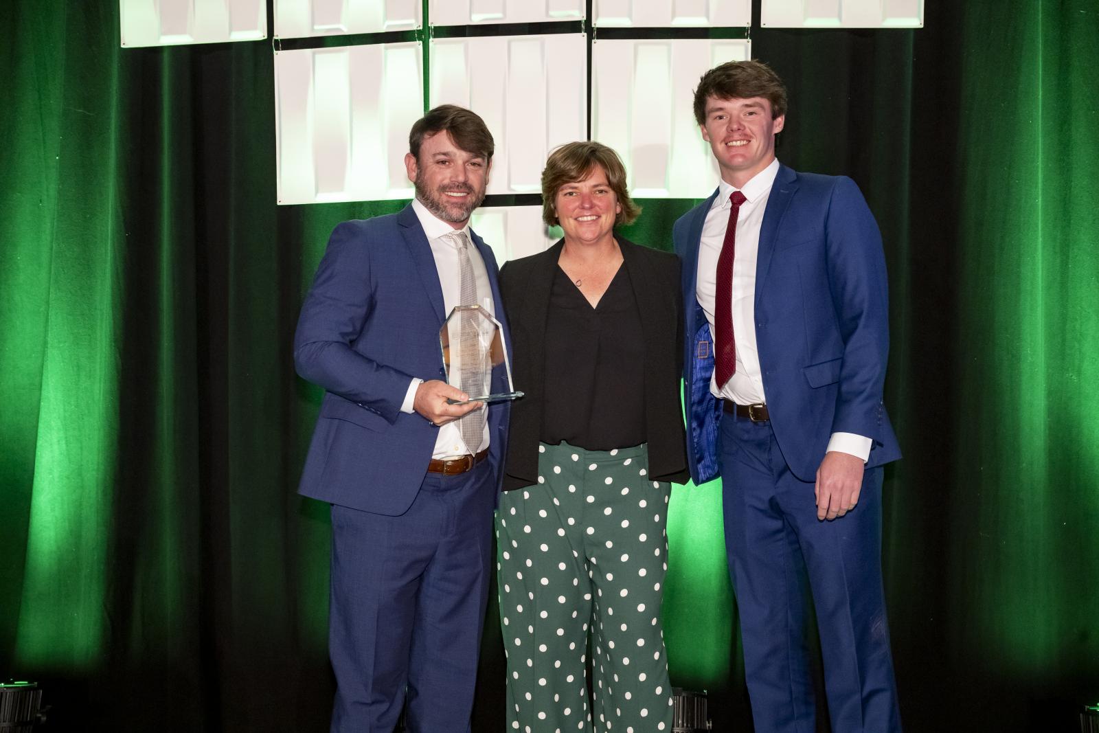 Mississippi State’s soccer field earned a top national honor during the 36th annual SFMA conference in Palm Springs, California. From left, Mississippi State Associate Director of Athletic Grounds Brandon Hardin, SFMA Board Past President Sun Roesslein and Sports Turf Specialist Hayes McMullen. (Photo Submitted)