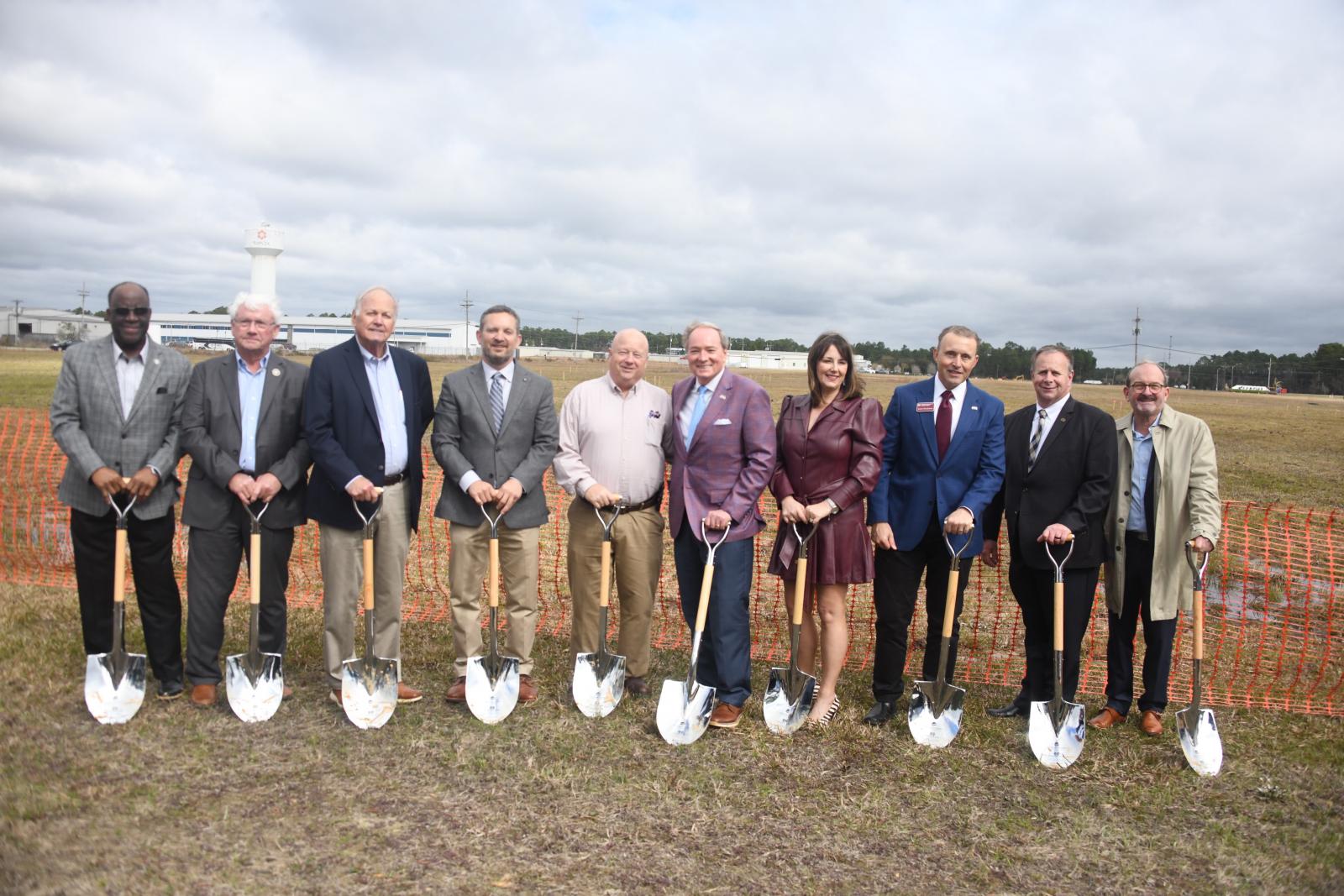 Pictured, from left, Ennit Morris, Barry Cumbest, Ken Taylor, all members of the Jackson County Board of Supervisors; Brian Fulton, Jackson County administrator; Randy Bosarge, Jackson County Board of Supervisors; MSU President Mark E. Keenum; Mary Martha Henson, Jackson County Economic Development Foundation; James Henderson, head of MSU’s Coastal Research and Extension Center; Scott Willard, MSU Mississippi Agricultural and Forestry Experiment Station director; and George Freeland, Jackson County Economic