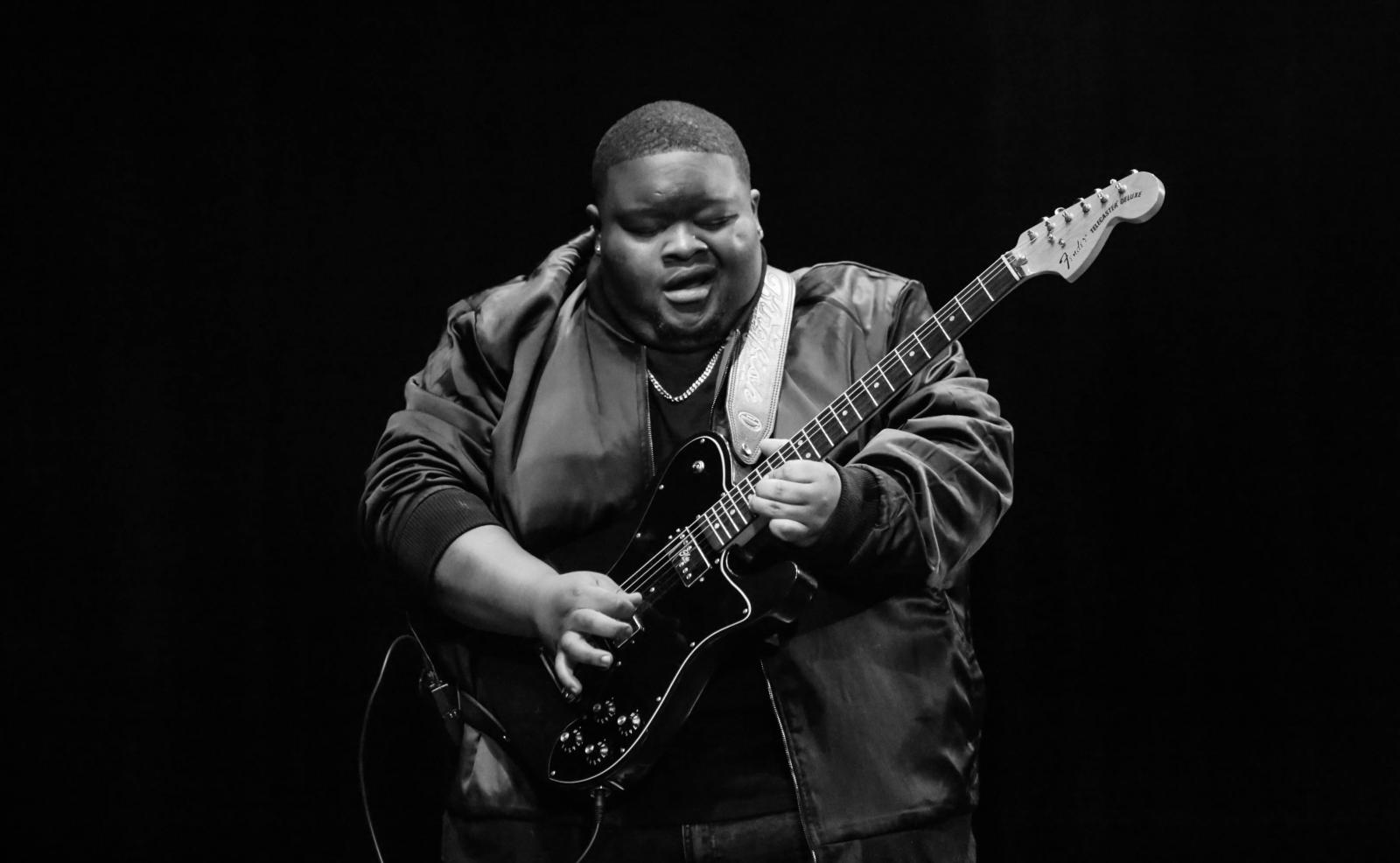 Kingfish playing guitar