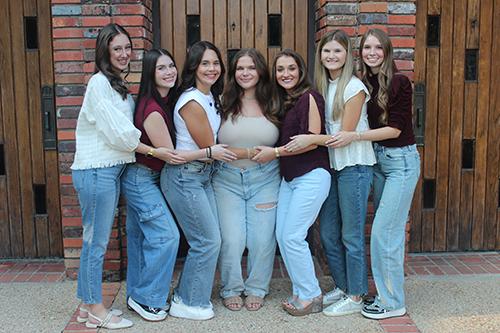 From left to right, spring 2025 graduate Greta Allen of Olive Branch, spring 2025 graduate Belle Fulkerson of Decatur, senior Parker Acosta of Mandeville, Louisiana, senior Chloe Martin of Lucedale, senior Caroline Flint of Sturgis, spring 2025 graduate Rileigh Campbell of Caledonia and spring 2025 graduate Olivia Callens of Tupelo pose for a picture outside the Chapel of Memories.