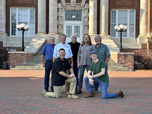 Members of Disco Stranglers pose on campus.