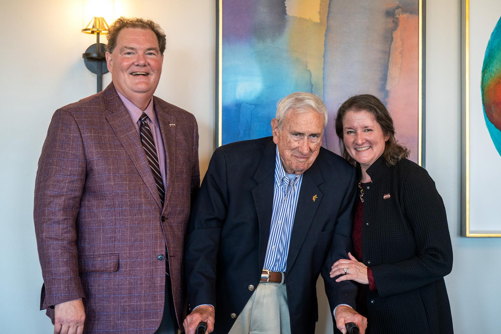Randy and Nina Cleveland of Fort Worth, Texas, visit with MSU Dean Emeritus of Education and Vice President Emeritus for Student Affairs Roy H. Ruby, center, during a luncheon following the ribbon-cutting ceremony for the Randy J. Cleveland Engineering Student Center.