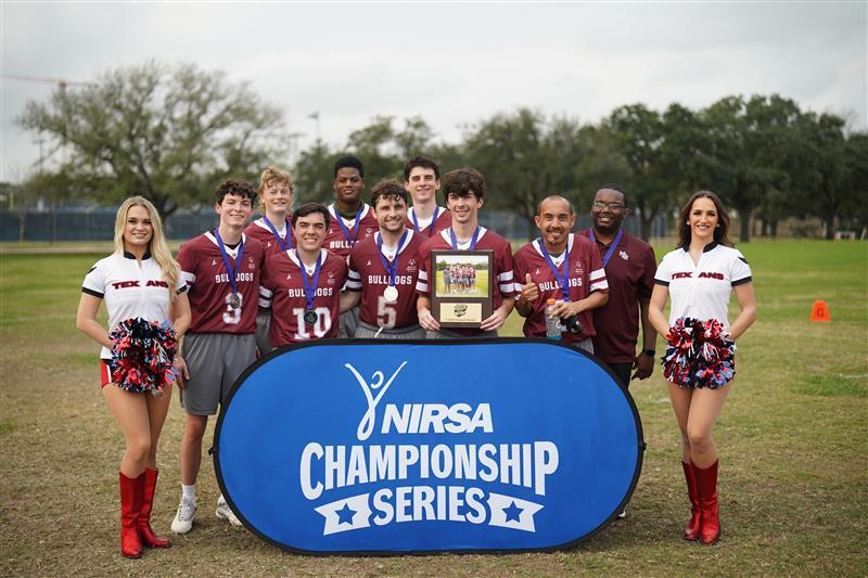 Mississippi State’s Special Olympics Club Unified flag football team athletes and partners celebrate their second-place national victory with tournament cheerleaders. Pictured front row, from left: Conner Davis, David King, Baylor Napoli, Hunter Hemby and Raffiel Jones; Back row, from left: Cooper Haynes, Marcus Smith, Trace Cockrell and Josh Wilson.