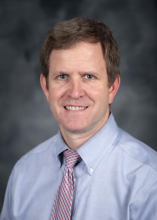 A portrait of Jack Smith.