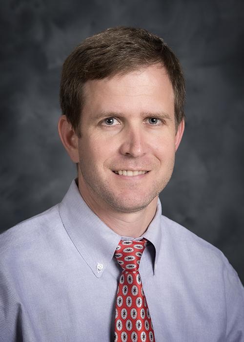 A portrait of Jack Smith.