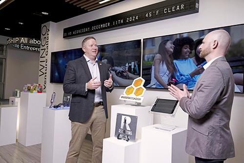 From left, Mississippi State College of Business Dean Scott Grawe and Center for Entrepreneurship and Outreach Director Nick Pashos discuss the university's E-Center and its programs.
