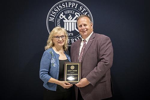 From left, Senior Research Associate Olga Pechanova, Institute for Genomics, Biocomputing and Biotechnology and MAFES Safety Award winner with Scott Willard, CALS dean, MAFES director and interim vice president for research and economic development. (Photo by David Ammon)