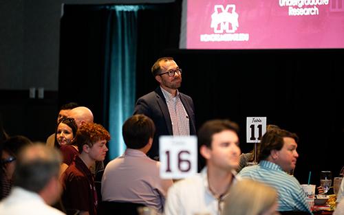 Judy and Bobby Shackouls Honors College Assistant Dean George Dunn is shown at a Scholars Recognition Lunch.