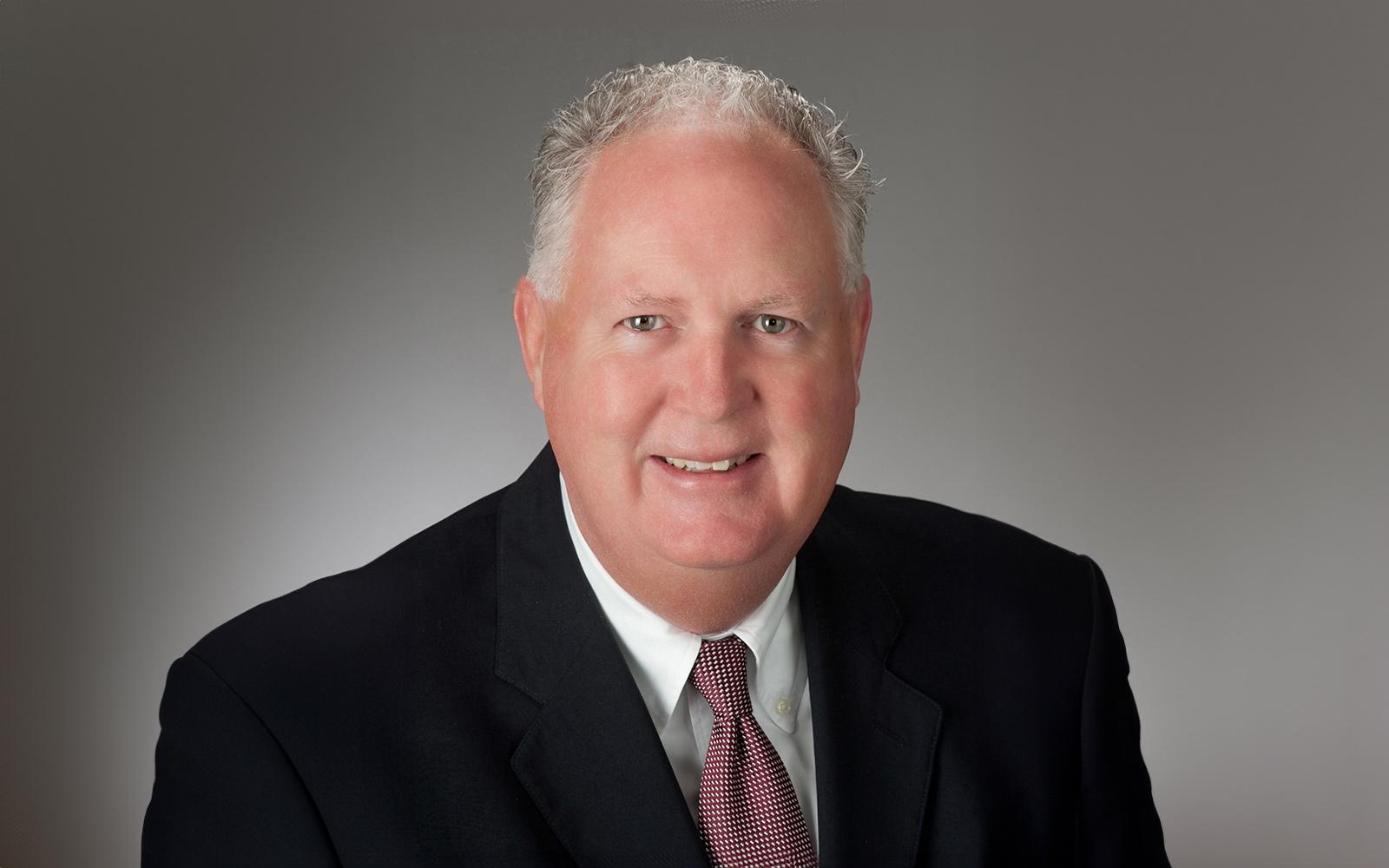 headshot of mike mcdaniel