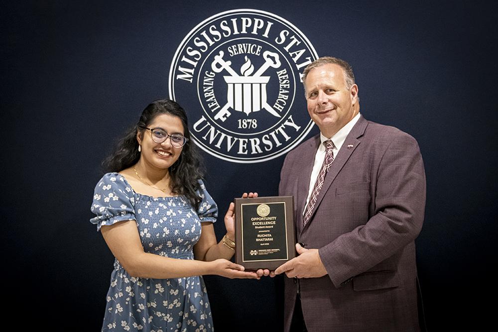 Ruchita Bhattarai, master’s student, Department of Plant and Soil Sciences and Opportunity Excellence Student, with Scott Willard, CALS dean, MAFES director and interim vice president for research and economic development.
