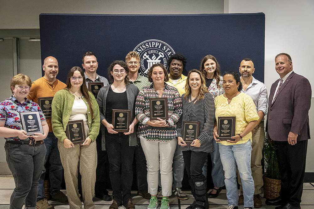 Front row, from left: Darby Tassell, Isabella Warden, Harry Jones, Jennifer Seltzer, Megan Gaulke and Nicole Rasoamanana. Back row, from left: Adam Haberski, Anthony Deczynski, Phillip Barlow, Tony Johnson, Leah Wisener, JoVonn Hill and Scott Willard.