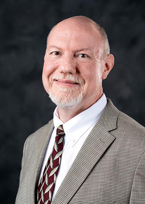 A portrait of Robert West.