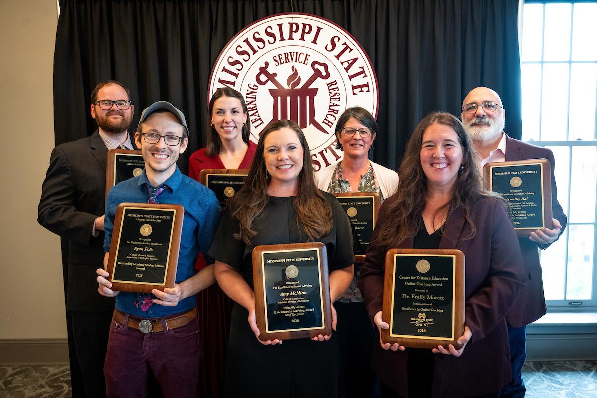A group photo of MSU faculty and staff receiving prestigious university awards on May 5..