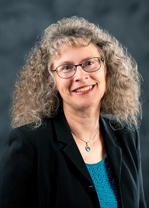 A portrait of Julie Jessop.