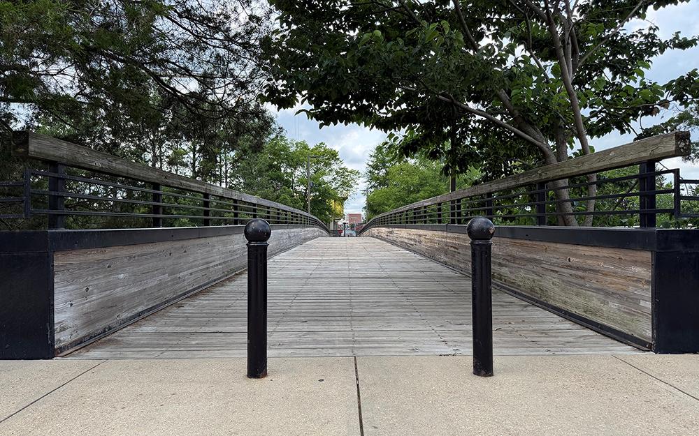The pedestrian bridge connecting Mississippi State and Starkville's Cotton District is shown.