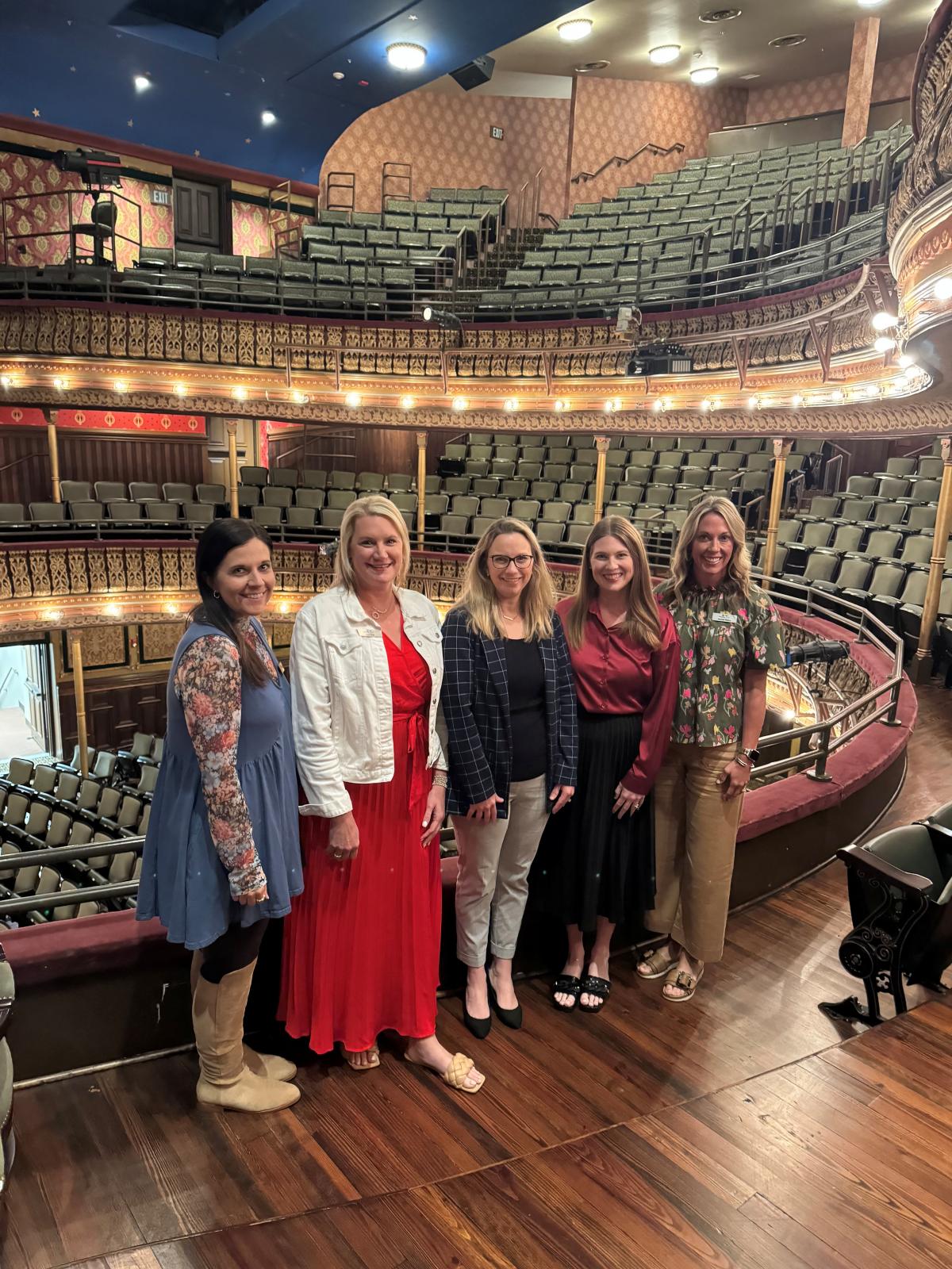 photo of five MSU-Meridian employees in the Riley Center.