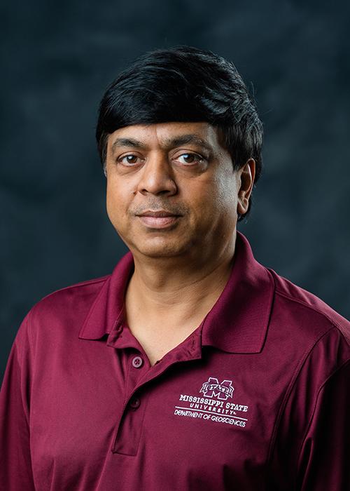 A portrait of Shrinidhi Ambinakudige.