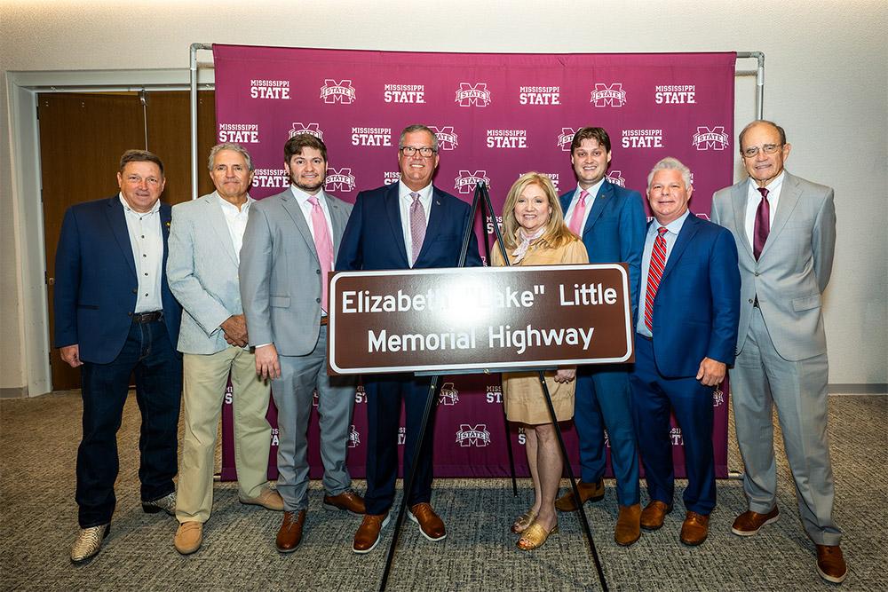 Pictured from left are Northern District Transportation Commissioner John Caldwell; State Sen. Chuck Younger; family members Patton, David, Pattie and Layton Little; State Representative Rob Roberson of Starkville; and Mississippi Lieutenant Governor Delbert Hosemann.