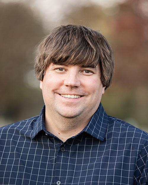 An outdoor portrait of Matthew Priddy.