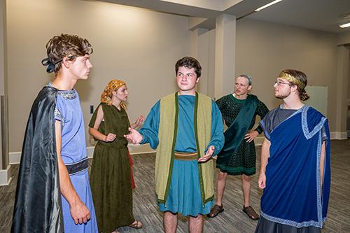 A small group of Mississippi State student-actors rehearse before a play.