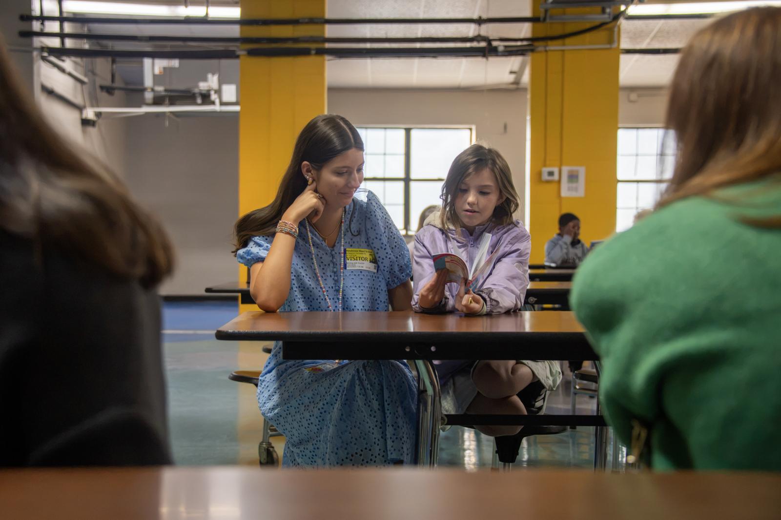 photo of an MSU student working with a Henderson Ward Stewart student
