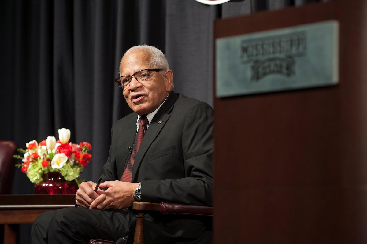 Dr. Richard E. Holmes speaking to a crowd