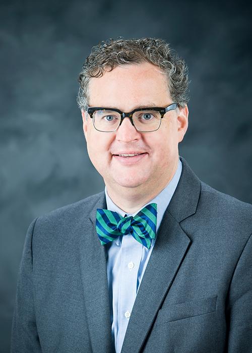 A portrait of James C. “Jim” Giesen.